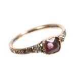 George III amethyst, diamond and enamel mourning ring with central amethyst flanked by two diamonds,