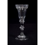 Georgian wine glass, circa 1760, with engraved pan top on knopped stem with air-bubble,