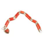 19th century carved coral bracelet with a double-strand of carved cylindrical links interspaced