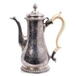 Fine quality George II silver coffee pot of baluster form, with gadrooned borders,