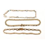 Two emerald and diamond bracelets and a gold and blue topaz bracelet (3)