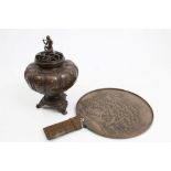 Late 19th century Japanese bronze hand mirror with crane and tree decoration and woven handle and