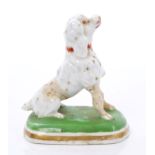 Chamberlains Worcester poodle, circa 1820, in seated pose, with red and gilt collar,