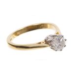 Diamond single stone ring with a round brilliant cut diamond estimated to weigh approximately 0.