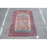 Good quality tree of life rug, typical design against cream ground within multiple borders,