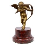 19th century ormolu figure of Cupid shooting his bow and arrow, on rouge marble socle base,