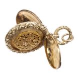 Regency yellow metal vinaigrette locket of circular form,