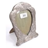 Early Edwardian silver photograph frame with Art Nouveau-style peacock,