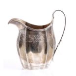 George III silver helmet cream jug with fluted panels and bright cut fruit and floral decoration,