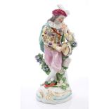 18th century Derby figure of a gentleman with a tambour and pipe,