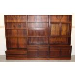 1960s Norwegian rosewood suite of display units - comprising three high shelved units with an