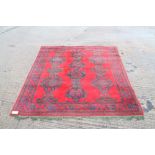 Antique Turkish rug with three rows of medallions in borders on blood red ground,