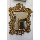19th century Italian giltwood wall mirror rectangular mirror plate within asymmetric pierced