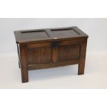 Late 17th / early 18th century oak coffer with two-panel hinged top and conforming front,