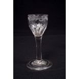 Georgian cordial glass, circa 1730, with petal moulded bowl with floral and leaf engraved rim,