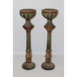 Pair of polychrome painted cast iron jardinières on stands - each fluted vase-form jardinière with