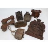 Group of antique Eastern carvings - to include an early Indian carved hardwood plaque depicting