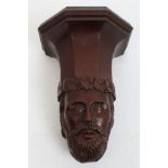 Victorian carved oak corbel - having faceted shelf,