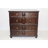 Late 17th century oak geometric chest in two parts, having four long drawers, raised on stiles,