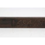 Large 17th century carved oak beam with repeated lunette motif and carved date 1654,