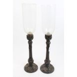 Pair early 19th century bronze storm lamps with adjustable sconces and anthemion and floral scroll