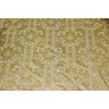 Pair of good quality gold floral damask interlined curtains with draped pelmets and curtain ties,