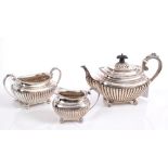 Victorian silver three piece bachelor tea set - comprising teapot of half fluted form,