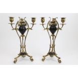Pair late 19th century bronze and gilt brass candlesticks - each with three branches and scroll