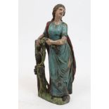 19th century Continental carved limewood and polychrome painted figure of a female holding a