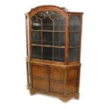 19th century Dutch oak standing display cabinet enclosed by astragal glazed door with canted glazed
