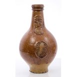 17th century Rhenish stoneware Bellarmine bottle with tiger brown mottled glaze, string neck,
