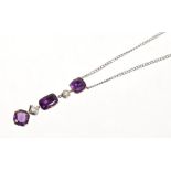 Amethyst and diamond pendant necklace with three mixed cut amethysts and two old cut diamonds,