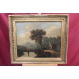 Early 19th century English School oil on canvas - river landscape with a figure on a bridge by a