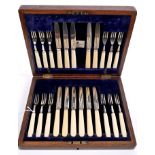 1920s part set of twelve pairs of silver fruit knives and forks with ivorine handles,