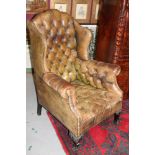 Good late 19th / early 20th century button leather upholstered wing armchair,
