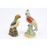 Victorian Staffordshire figure of a parrot perched on tree stump with polychrome painted decoration,