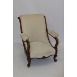 Victorian walnut easy chair cream upholstered back and pad arms raised on carved cabriole legs