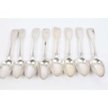 Eight Victorian silver fiddle pattern dessert spoons with engraved initials (various dates and