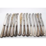 Set of twelve George III silver pistol-handled dinner knives with steel blades, cutler's mark - H.