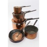 Tower of antique copper lidded saucepans - various types and sizes,