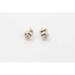 Pair diamond stud earrings, each with a brilliant cut diamond estimated to weigh approximately 0.