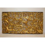 Good and imposing Chinese carved red and gilt lacquered sectional frieze,