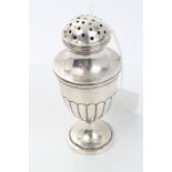 George III silver urn caster with half fluted body and waisted slip-on cover with pierced top,