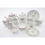 Collection of early 19th century Coalport teawares with polychrome floral sprigs - including
