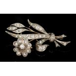 Victorian diamond floral spray brooch with old cut diamonds, in silver and yellow metal setting,