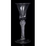 Georgian wine glass with bell-shaped bowl, on shoulder knopped air-twist stem on plain foot,