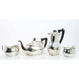 Late 1930s silver four piece tea set - comprising teapot of shaped baluster form, with flared rim,