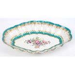 18th century Worcester lozenge-shaped dish with polychrome floral spray and gilt and turquoise