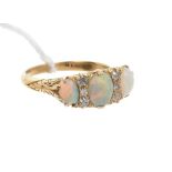Gold (18ct) opal and diamond ring with three oval opals interspaced by six old cut diamonds in