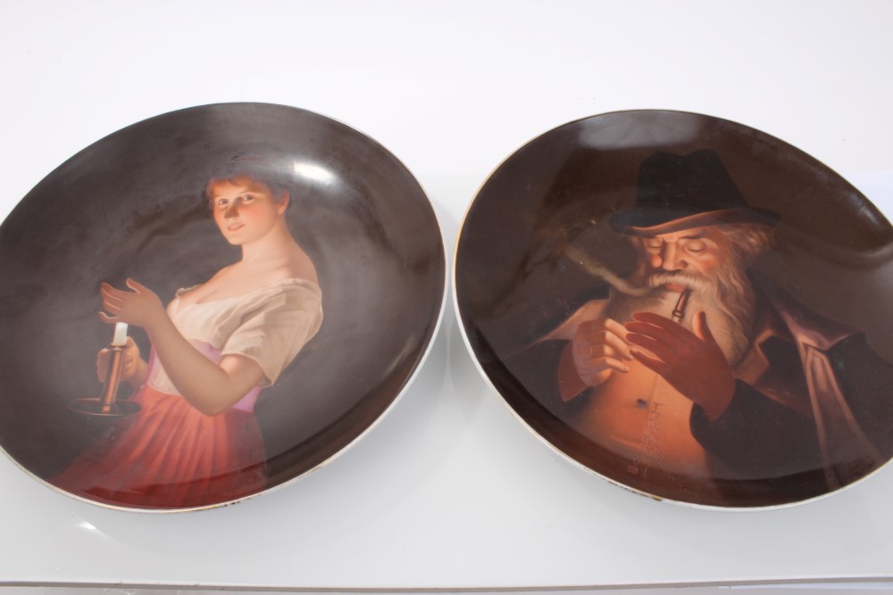 Pair late 19th century Vienna porcelain dishes painted with a girl in red dress,